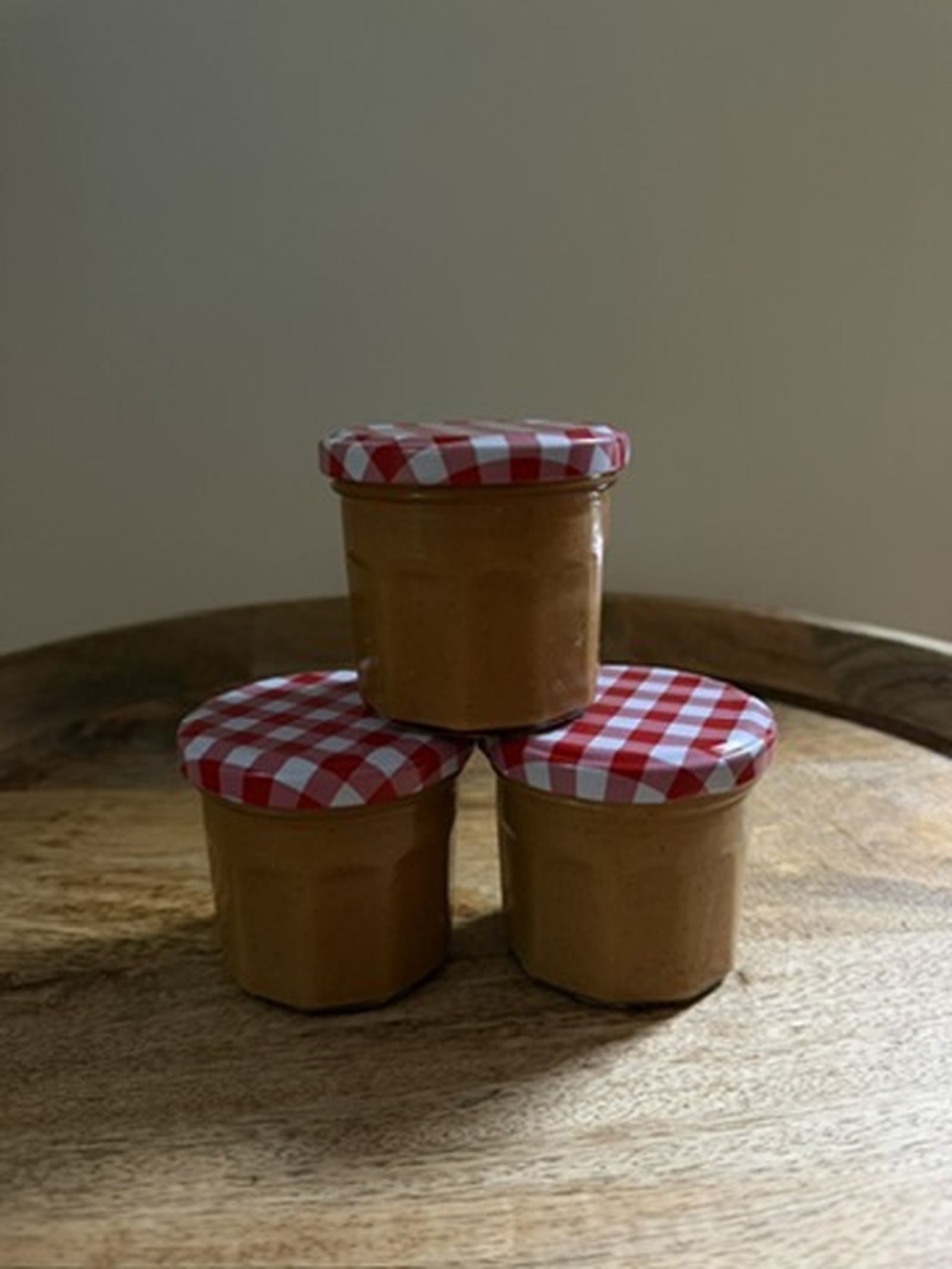 Three jars of homemade peanut butter